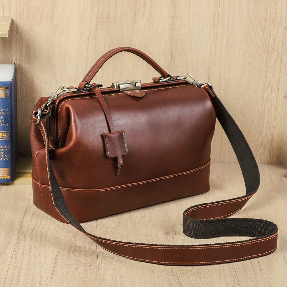 2026 Black Angel Retro Top Grain Cowhide Women's Handbag Off-road Motorcycle High-end Push-lock Women's Genuine Leather Shoulder Crossbody Bag.